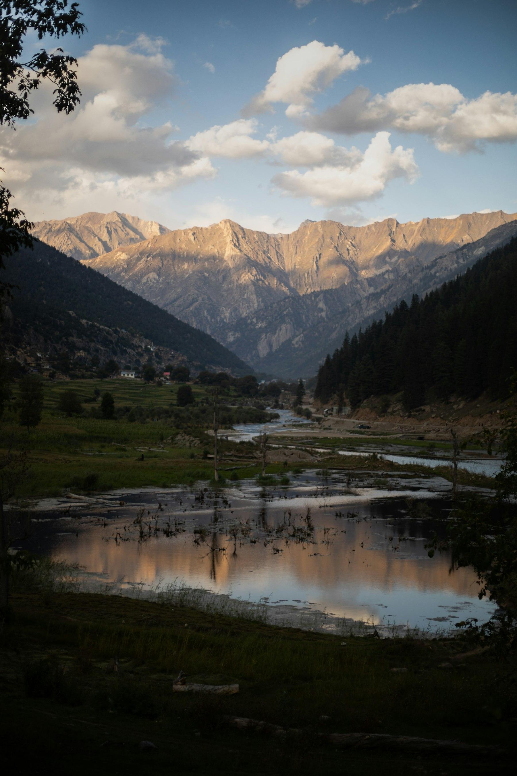 Mountain valley and river at golden hour in Afghanistan